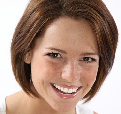 Lady with a short brown hair smiling, LASER RESURFACING, Fort Lauderdale FL